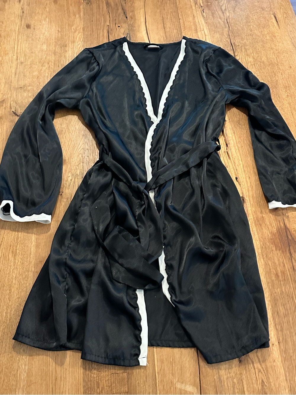 Enchanting black with white trim mid length robe with belt